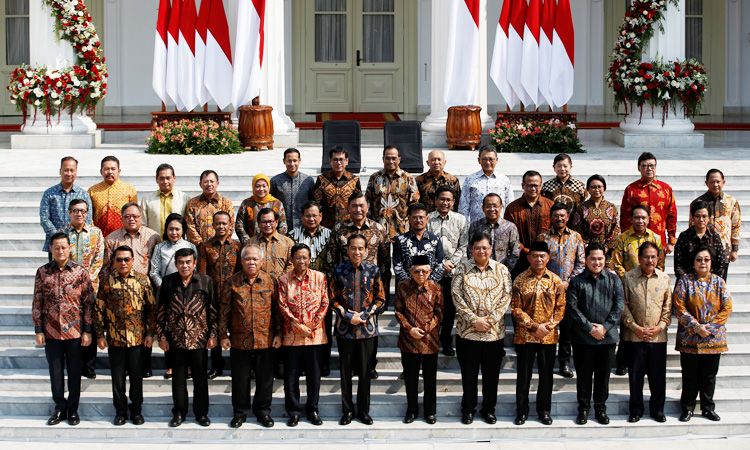 Indonesia president names cabinet, includes fierce rival