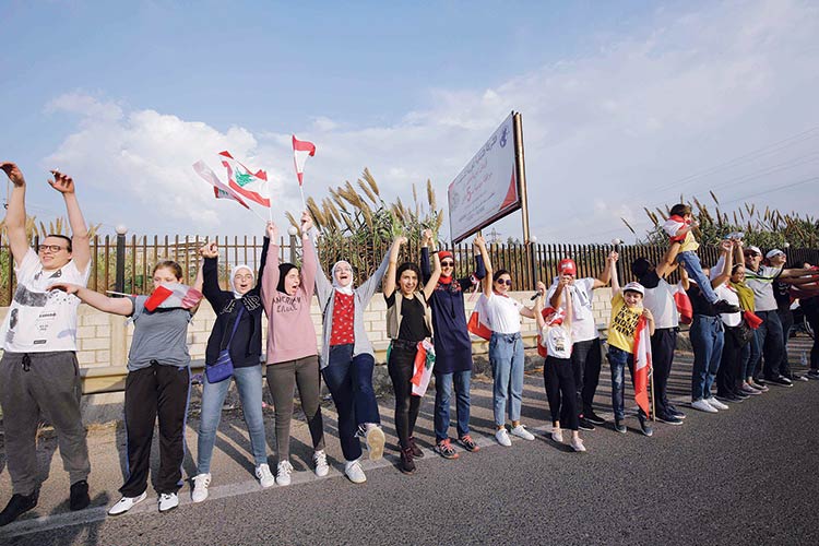 VIDEO: Lebanon protesters form 170-kilometre-long nationwide human chain