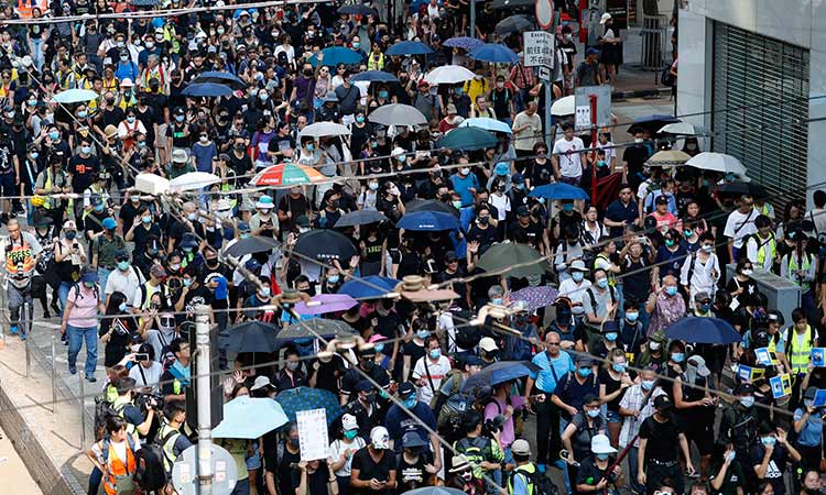 Hundreds return to Hong Kong streets as metro shut after violence