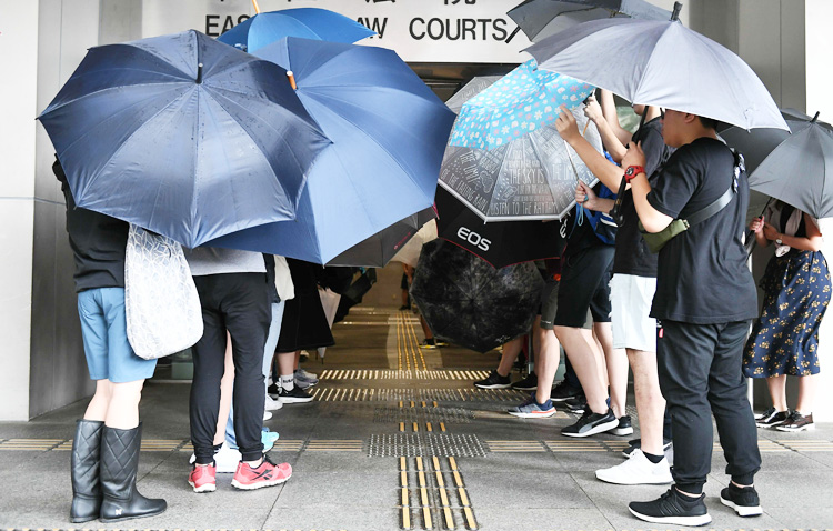 First Hong Kongers appear in court for defying mask ban