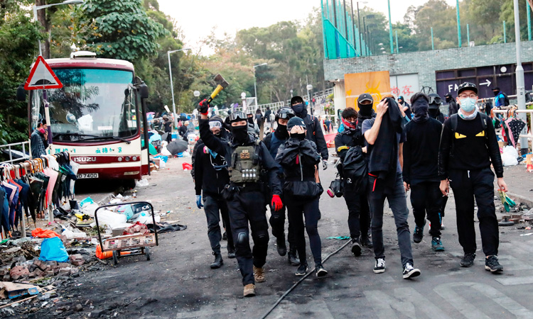 Citywide protests disrupt Hong Kong as students barricade campuses