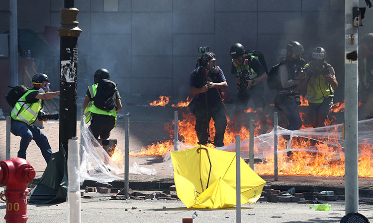 Hong Kong University engulfed with tear gas, firebombs in new clash