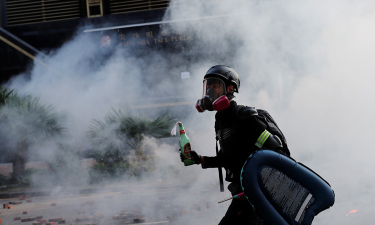 Hong Kong police seal off university, raising fears of crackdown