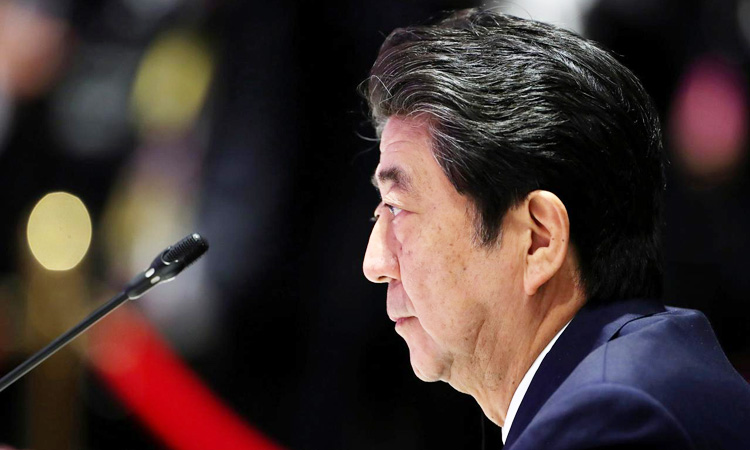 Japan’s Abe ties record for longest-serving PM as allegations of misdeeds persist