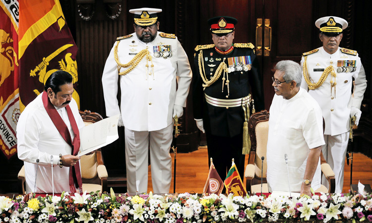 Sri Lanka's new leader appoints his PM brother as finance minister