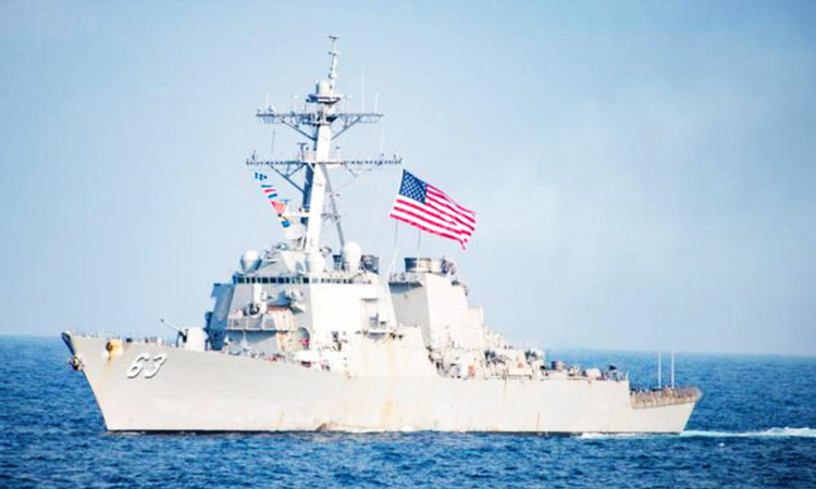 US warships sail in disputed South China Sea, angering China