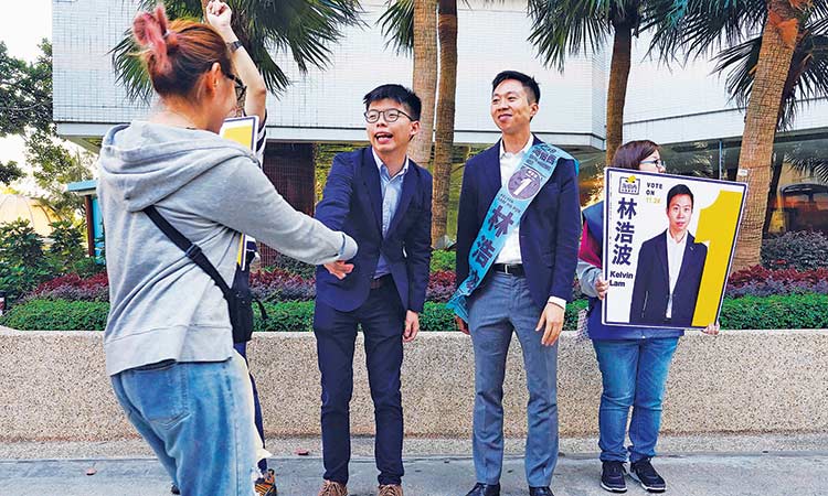 Hong Kong protests simmer ahead of local elections