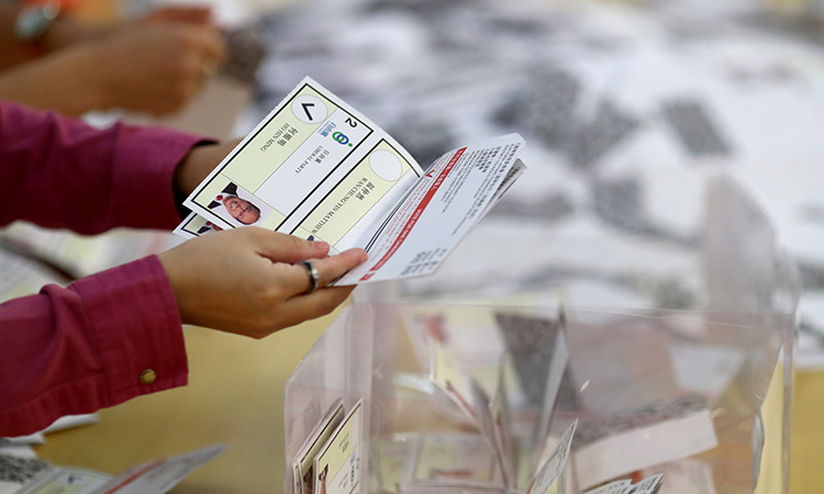 Hong Kong establishment crushed at polls in stark message to Beijing