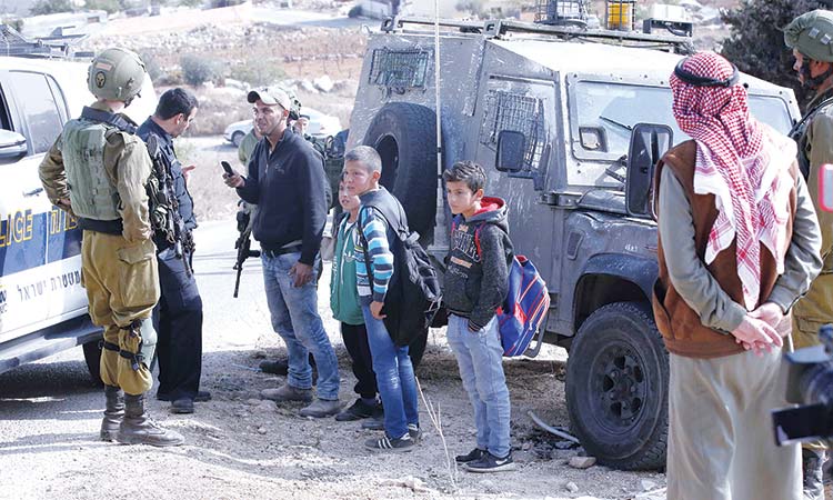 Israeli troops raid W. Bank homes, arrest 8 Palestinians