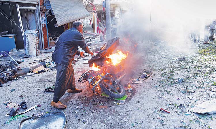 At least 13 killed in car bomb in Syrian border town: Official