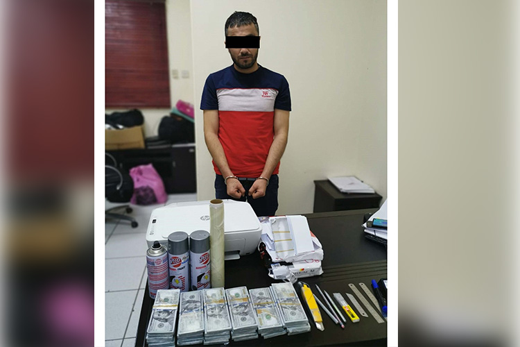 Man arrested for selling fake dollars in Ajman