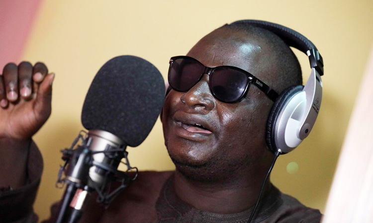 Blind singer goes from streets to stardom in north Nigeria