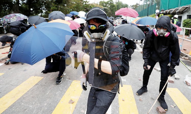 Hong Kong police fire tear gas as transport chaos grips city