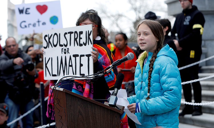 Eco-warrior Greta's father says activism makes her happy 