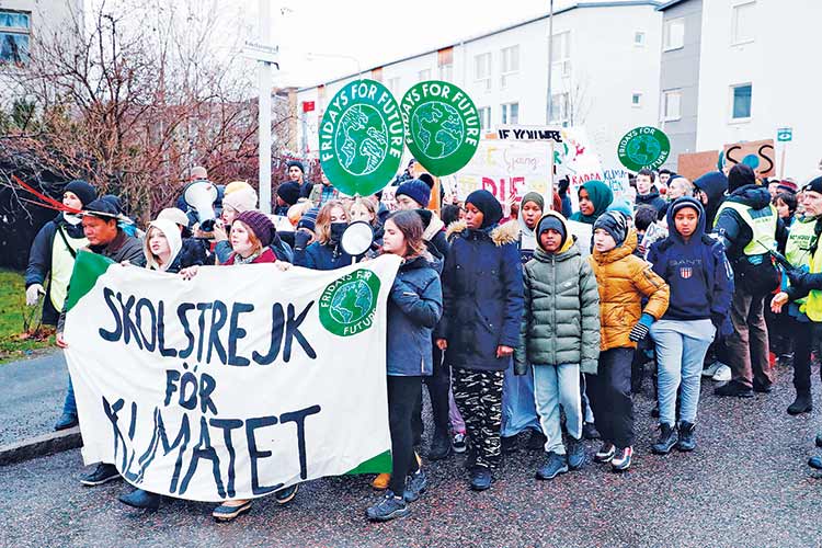 Thousands rally demanding action on climate crisis