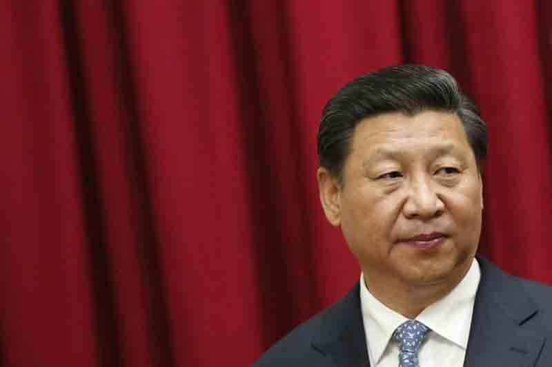 Xi visits Wuhan as new virus cases tumble