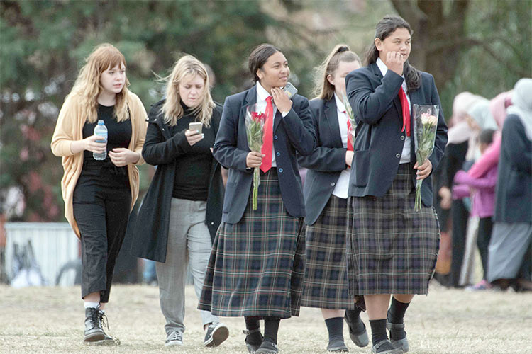 'Kiss and go': Back to school for New Zealand kids