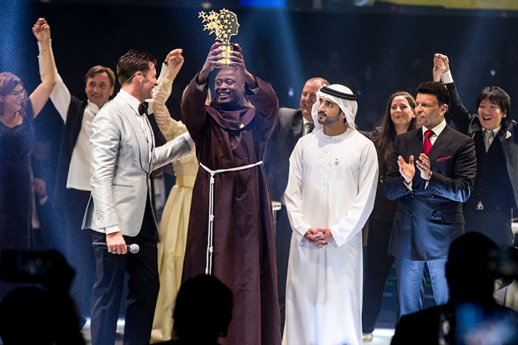 Kenyan who gave earnings to poor wins $1m teacher prize in Dubai 