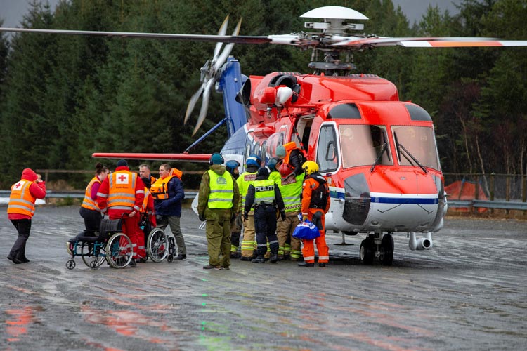 Norway tugs tow stricken liner after hundreds airlifted to safety