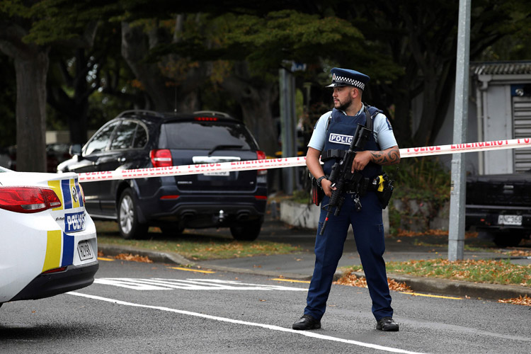 NZ police probe mosque attack links after man dies in stand-off