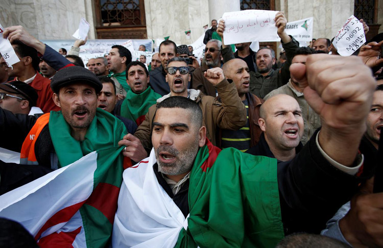 Protesters gather in Algiers as Bouteflika clings to power 