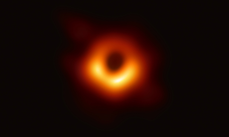 Scientists reveal first image ever made of a black hole