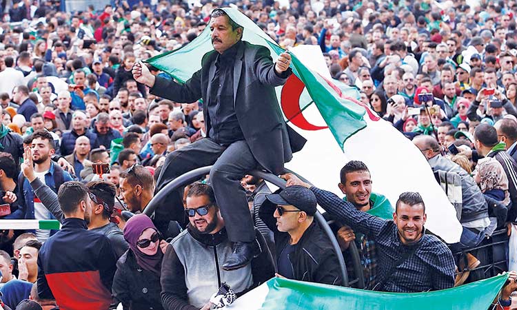 Algerians stage protest under police surveillance