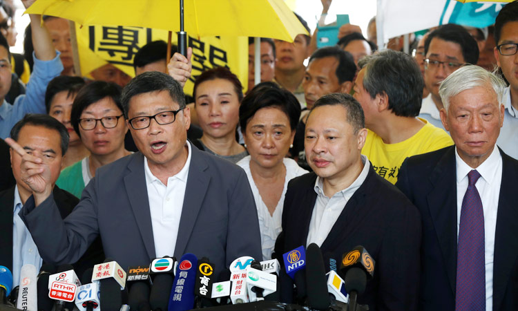 Hong Kong democracy leaders jailed over Umbrella Movement protests