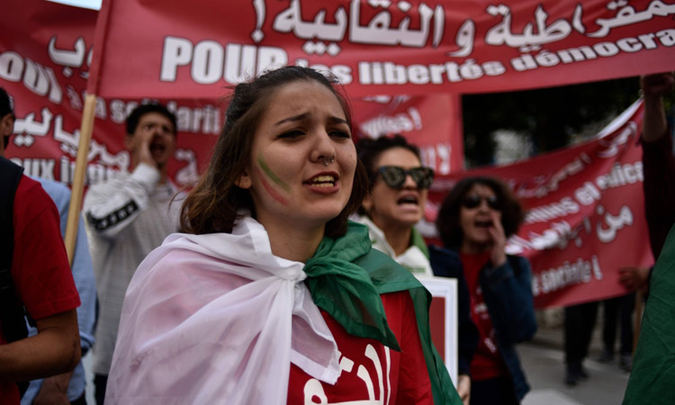 Tens of thousands protest against Algeria's ruling elite 