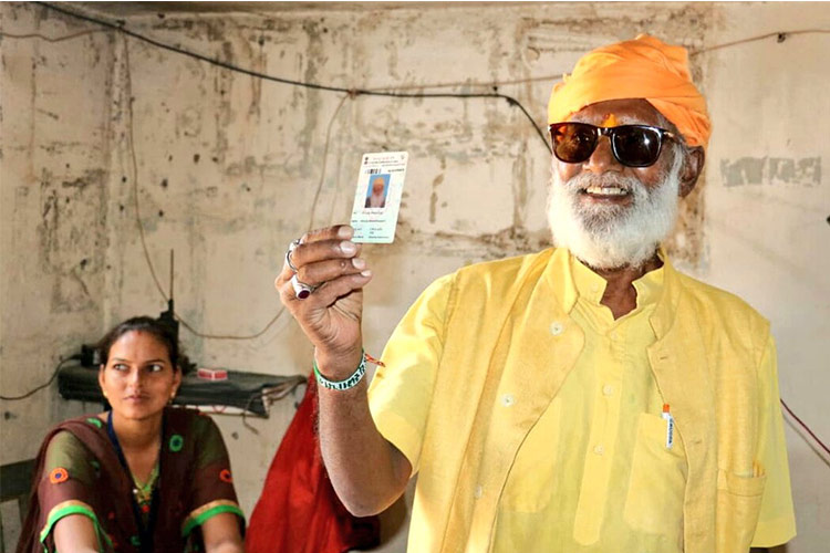 Indian officials travel deep into jungle to allow one temple priest to vote