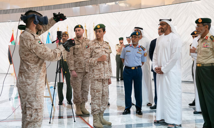 Mohamed Bin Zayed learns about AI projects by National Service recruits