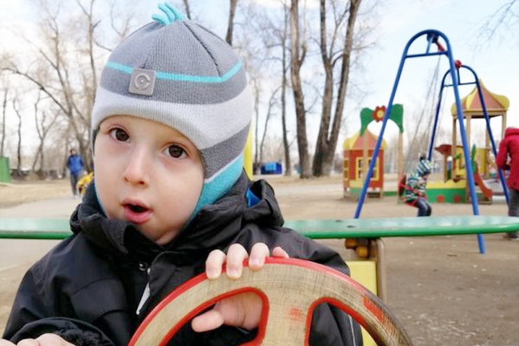 Russian child suffers from rare disease that is turning him into a real-life stone statue