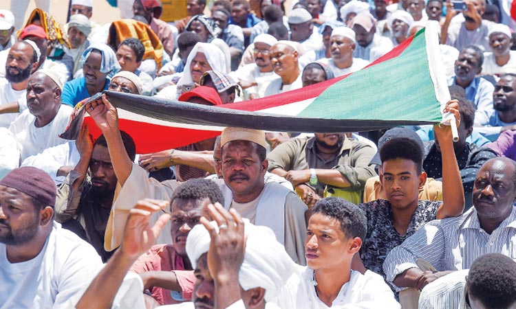 Sudan protesters tear down roadblocks at Nile Street