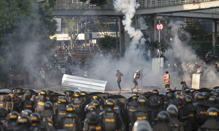 Six die, protests swell as Indonesia plunges into post-election unrest