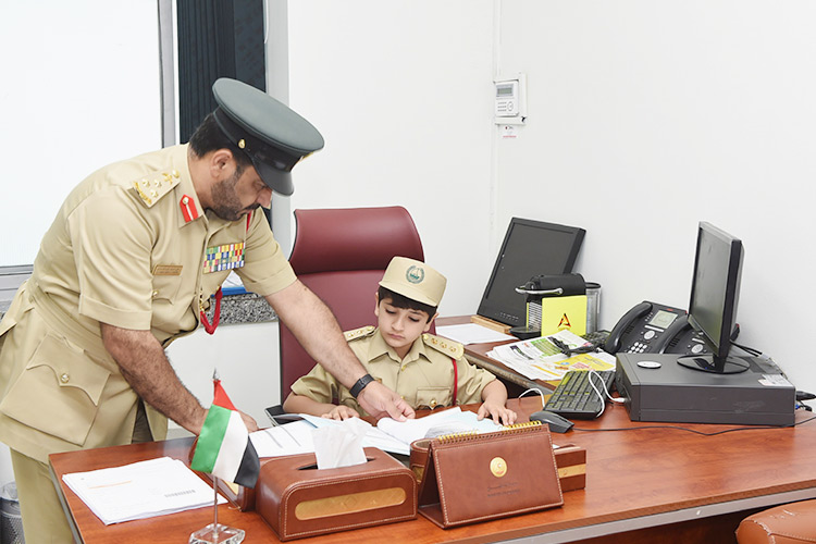 Watch how a young boy becomes a police officer for a day in Dubai