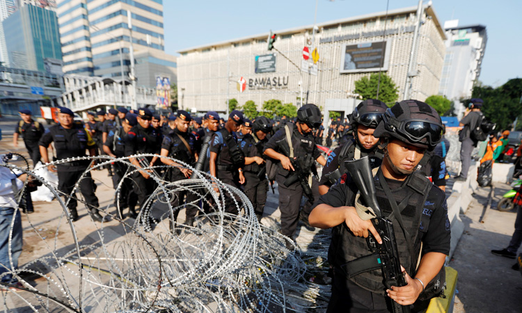 Indonesian troops flood Jakarta streets after post-election riots