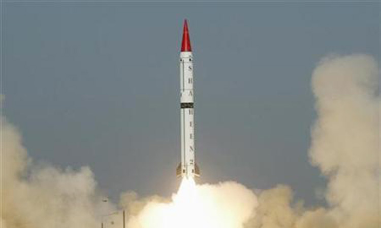 Pakistan says wants peace with India, conducts missile test