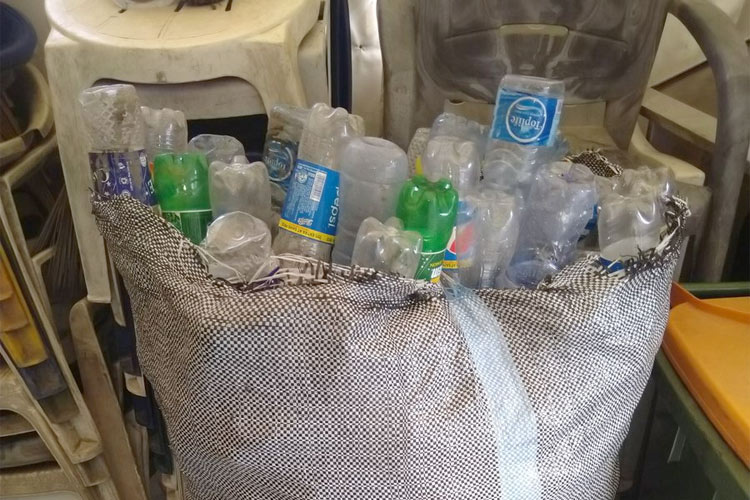 Plastic bottles, cans in exchange for school fees in Nigeria 