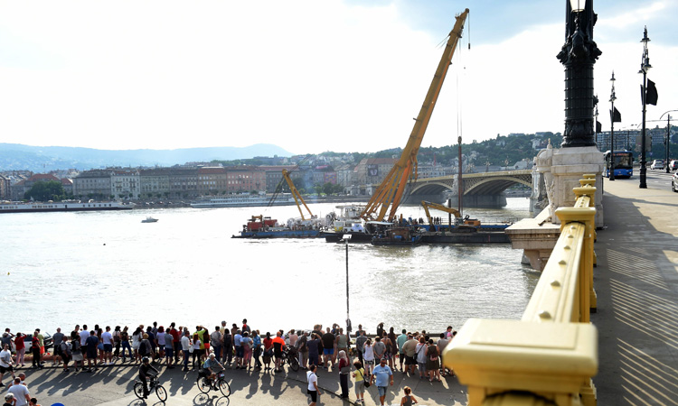 Hungary police lift capsized tourist boat from river