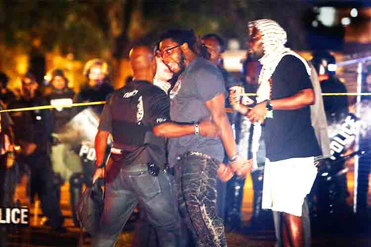 Two dozen police hurt in Memphis street clashes after marshals kill black man