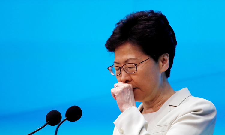 Hong Kong leader says sorry again after fury at extradition bill