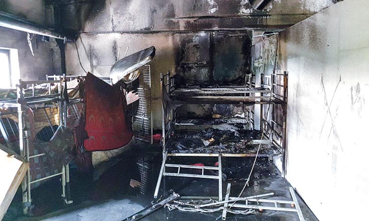 32 injured in fire at Bosnia migrant shelter