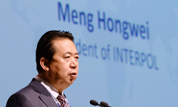 China’s former Interpol chief pleads guilty to bribery