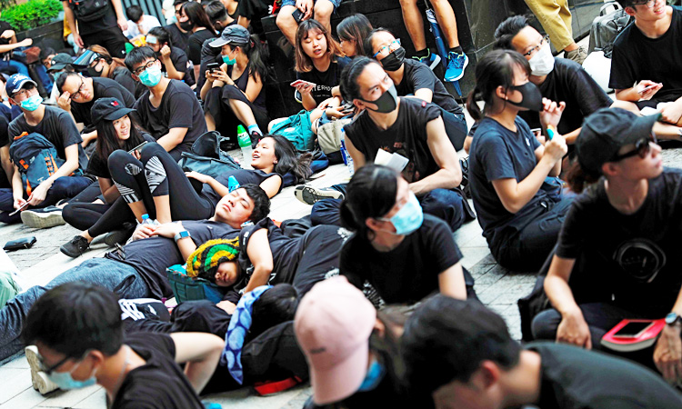 Black-clad protesters demand full withdrawal of Hong Kong extradition bill