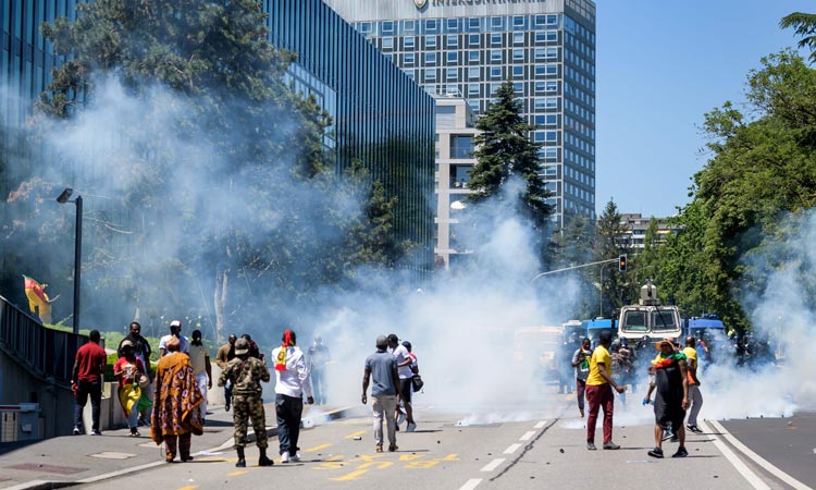 Swiss police fire water cannon, stun grenades at Cameroon protesters