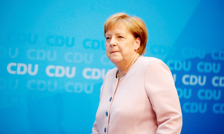 Crisis talks as Angela Merkel’s coalition suffers new blow