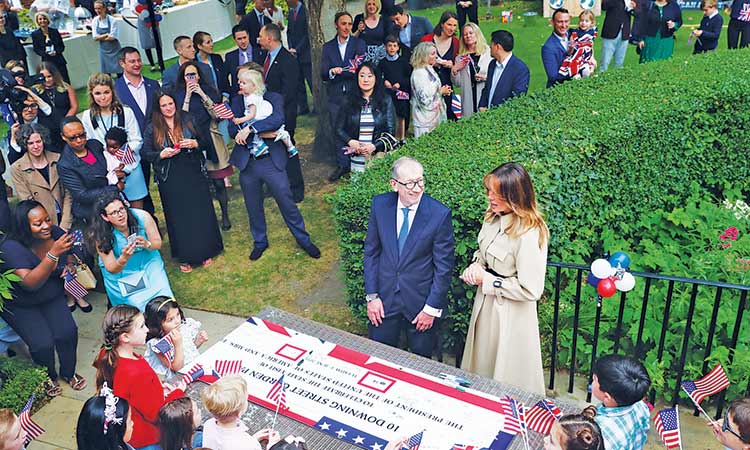 Melania and Philip attend garden party