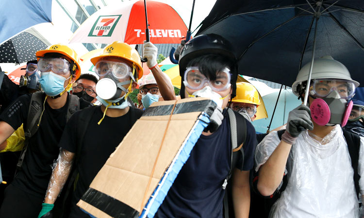 Hong Kong protesters clash with police on handover anniversary