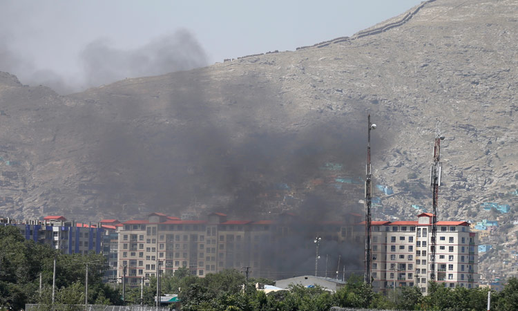 Explosion, gunfire kill 19 near military hospital in Kabul