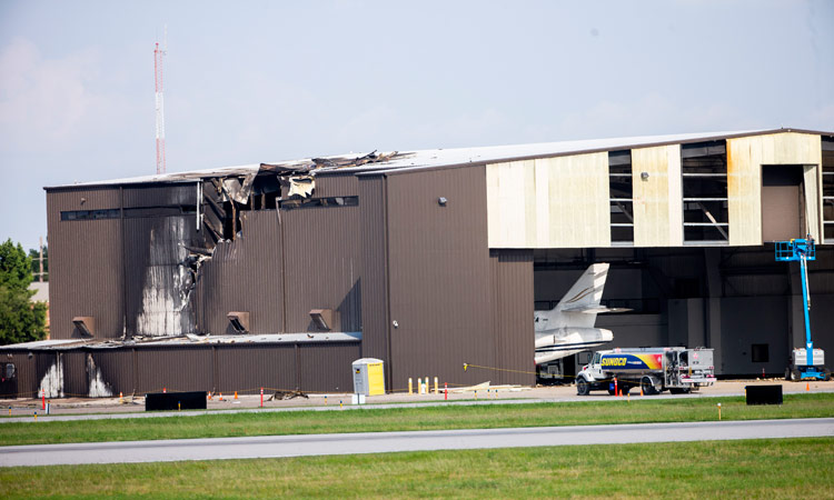 10 killed as small plane crashes into Texas airport hangar